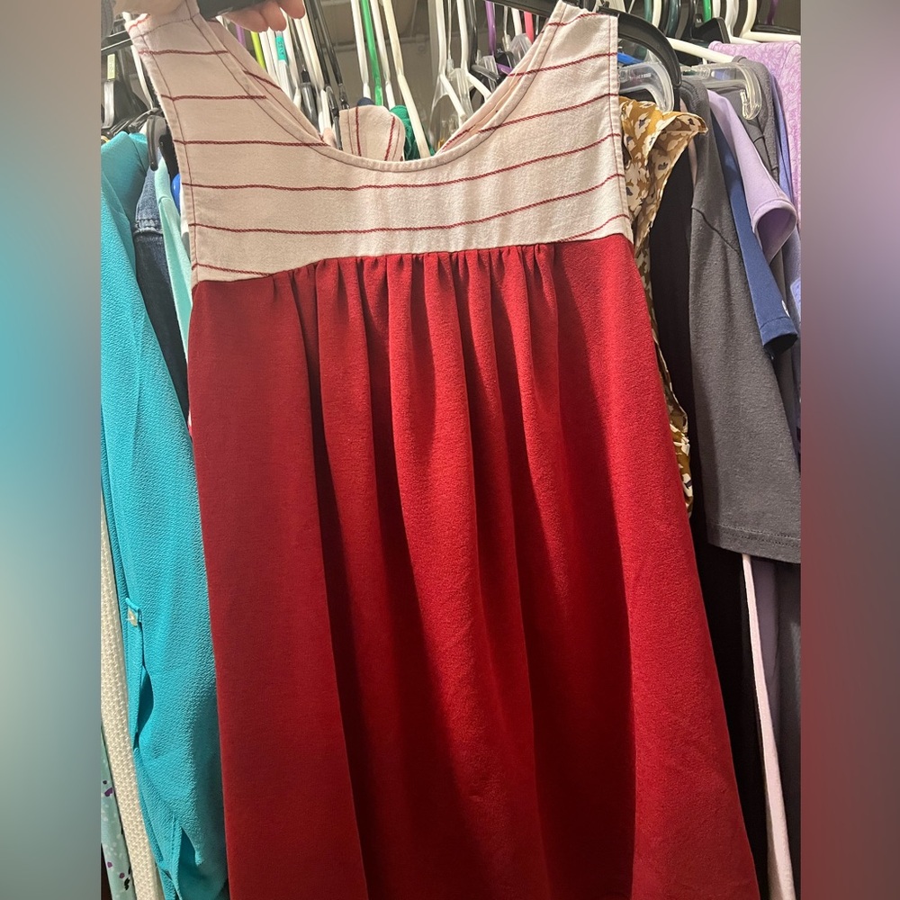 Wine tank with tie back